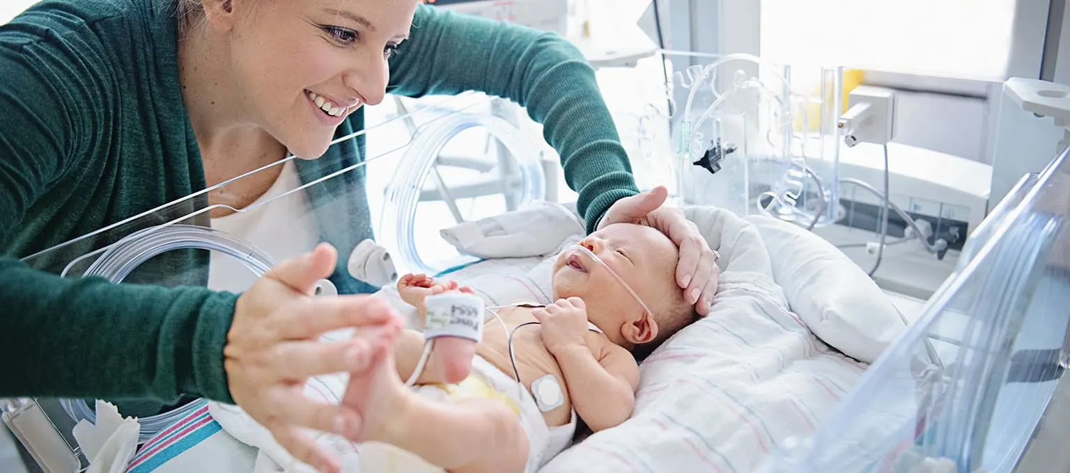 Premature baby in incubator