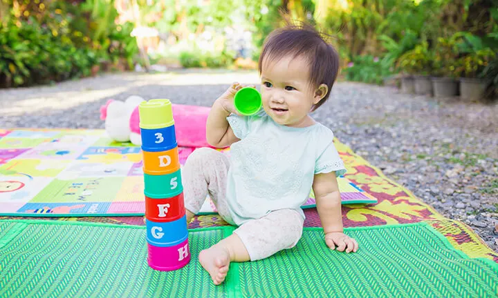 Baby playing outdoors