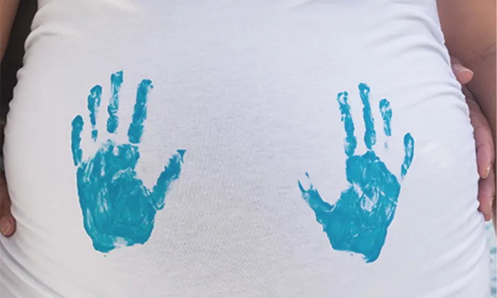 Pink and Blue Handprints gender reveal