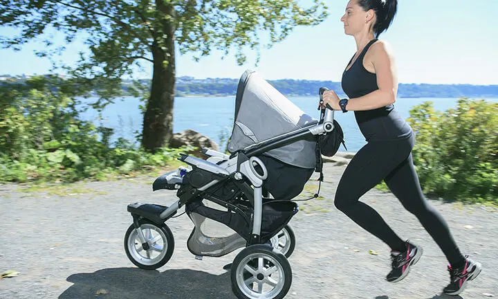 Mom running with baby